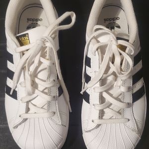 Adidas gym shoes.